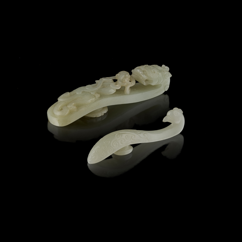 TWO CELADON JADE BELT HOOKS