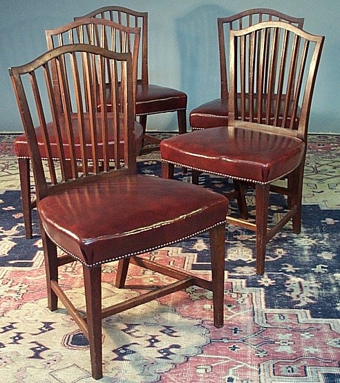 A set of five mahogany dining chairs
