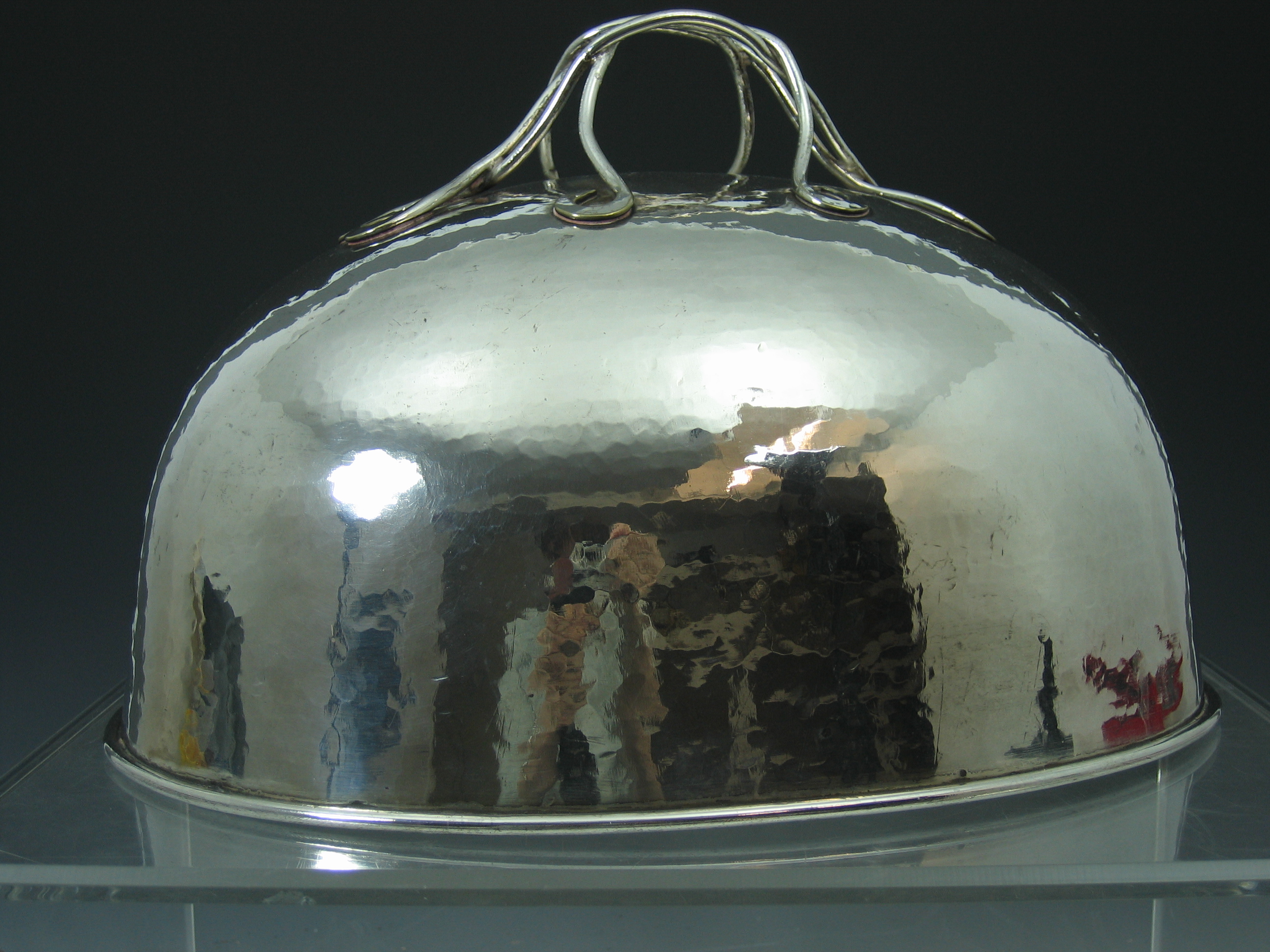 C.R. Ashbee (1863-1942) An Arts and Crafts electroplated dish cover,