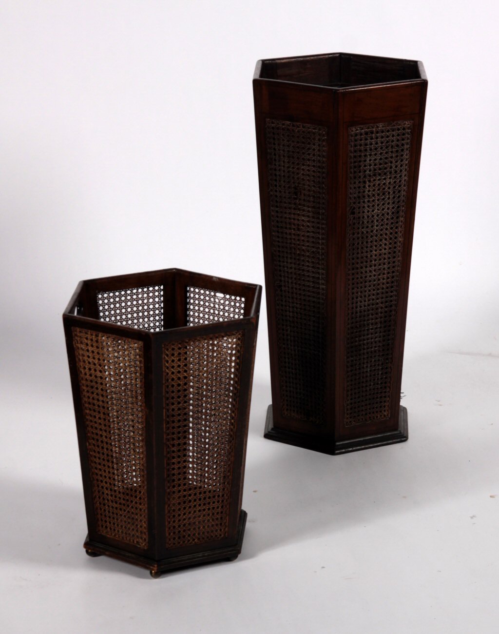 An early 20th century mahogany and ebony strung hexagonal stick stand