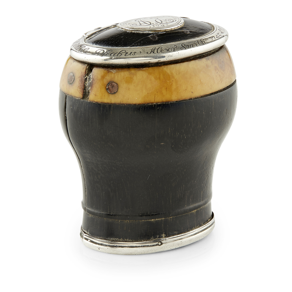 AN IVORY AND EBONY BALUSTER SNUFF MULL
