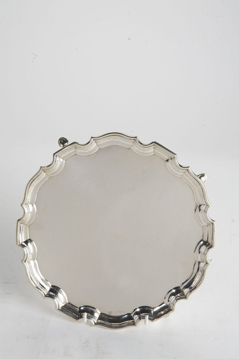 A circular silver salver