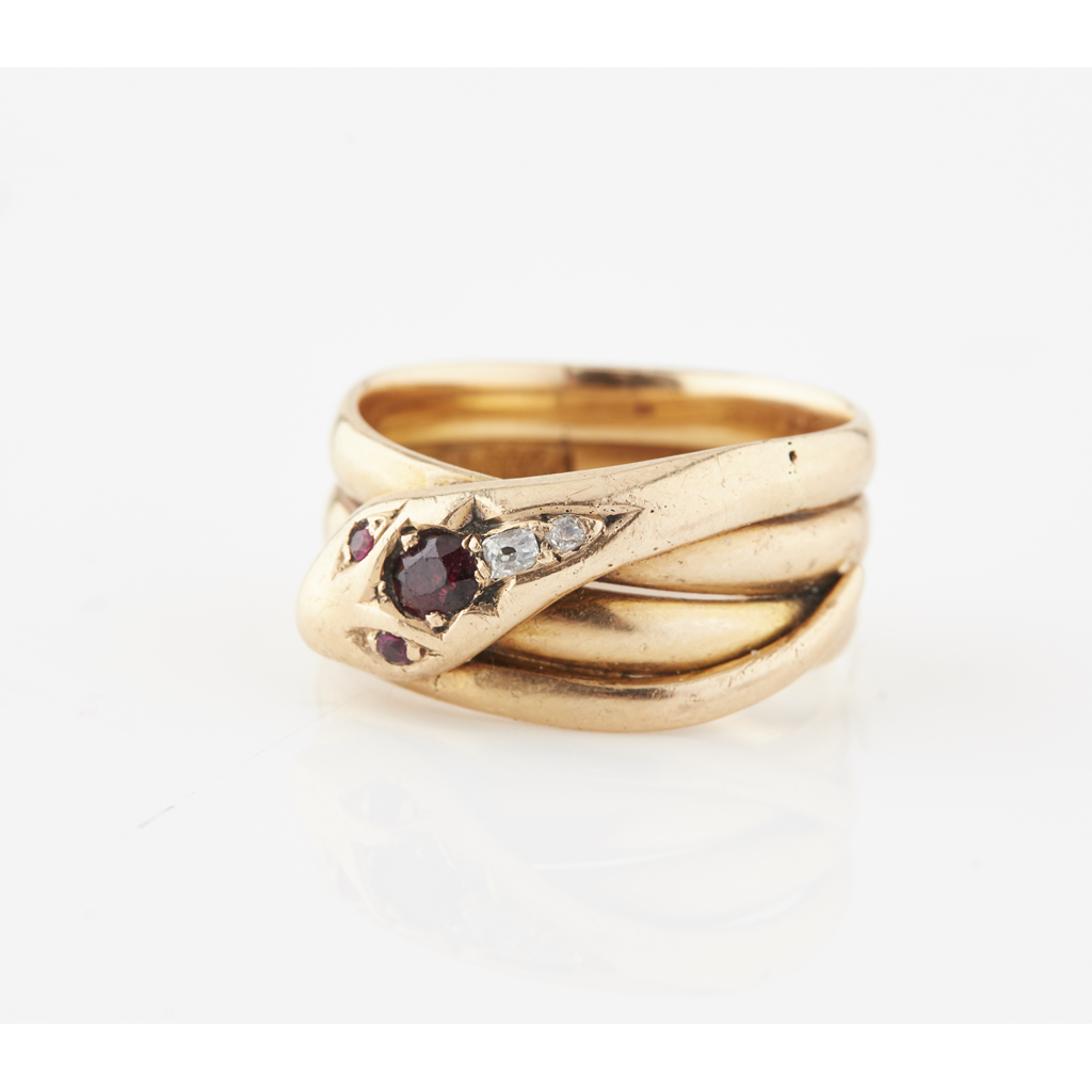 A Victorian gold, ruby and diamond set snake ring