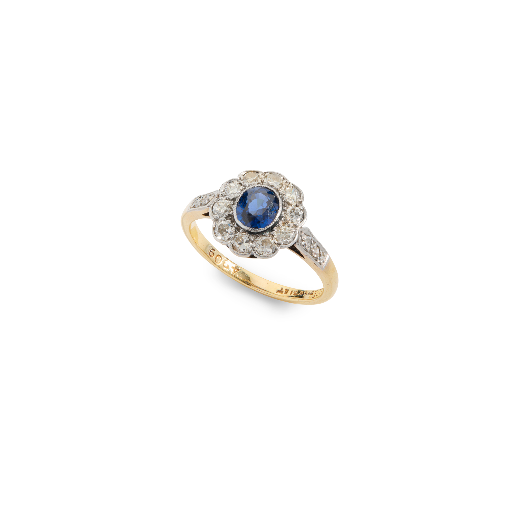 A sapphire and diamond cluster ring
