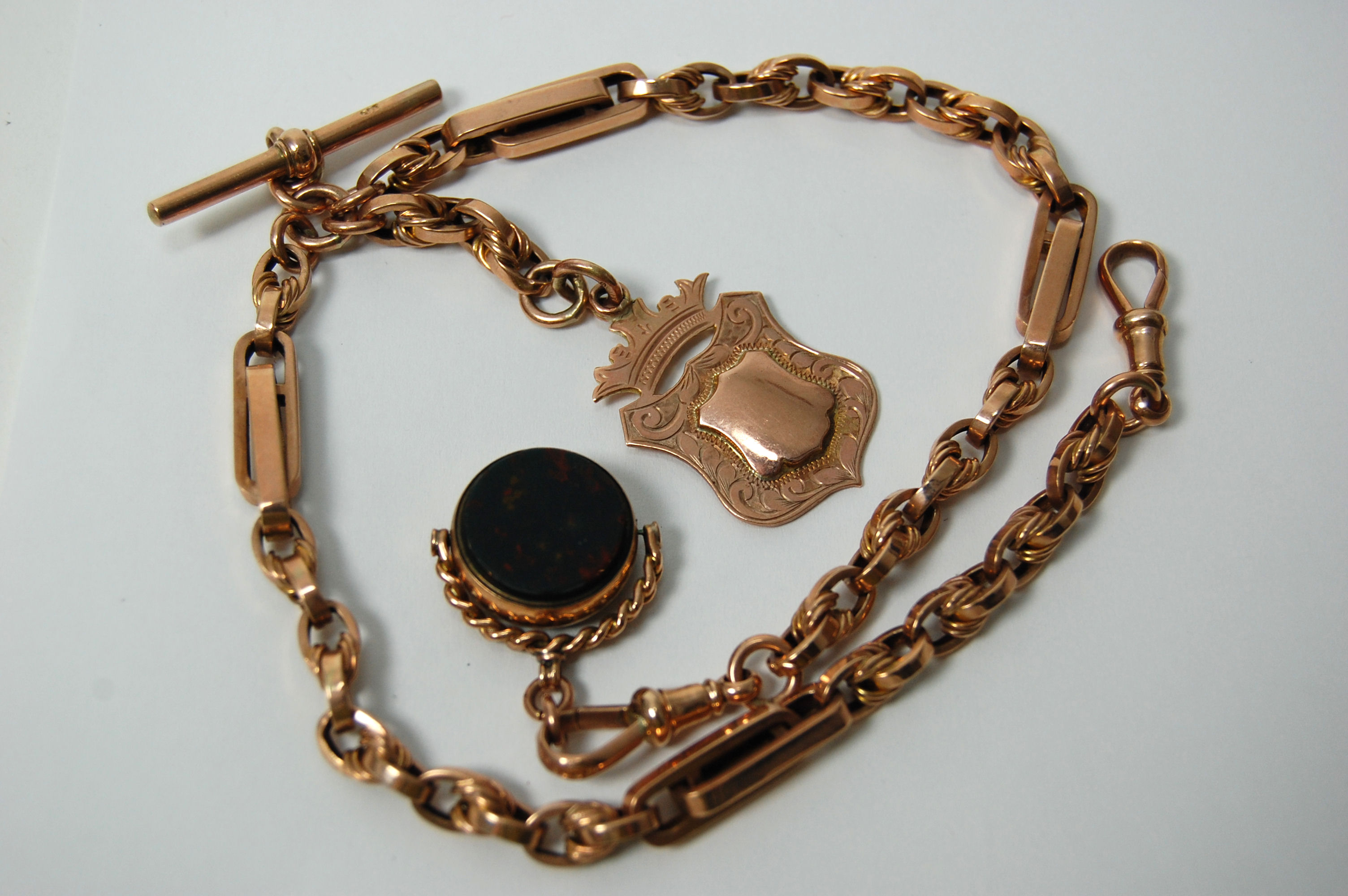 A 9ct rose gold fancy link Albert chain,