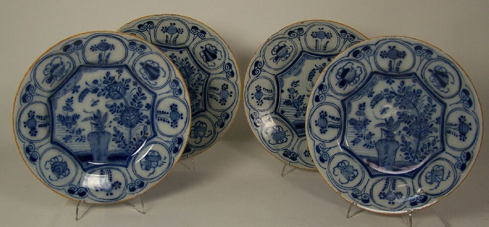 A set of four 18th century blue painted Delft plates