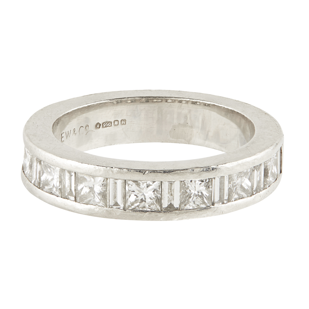 A diamond set half-eternity ring