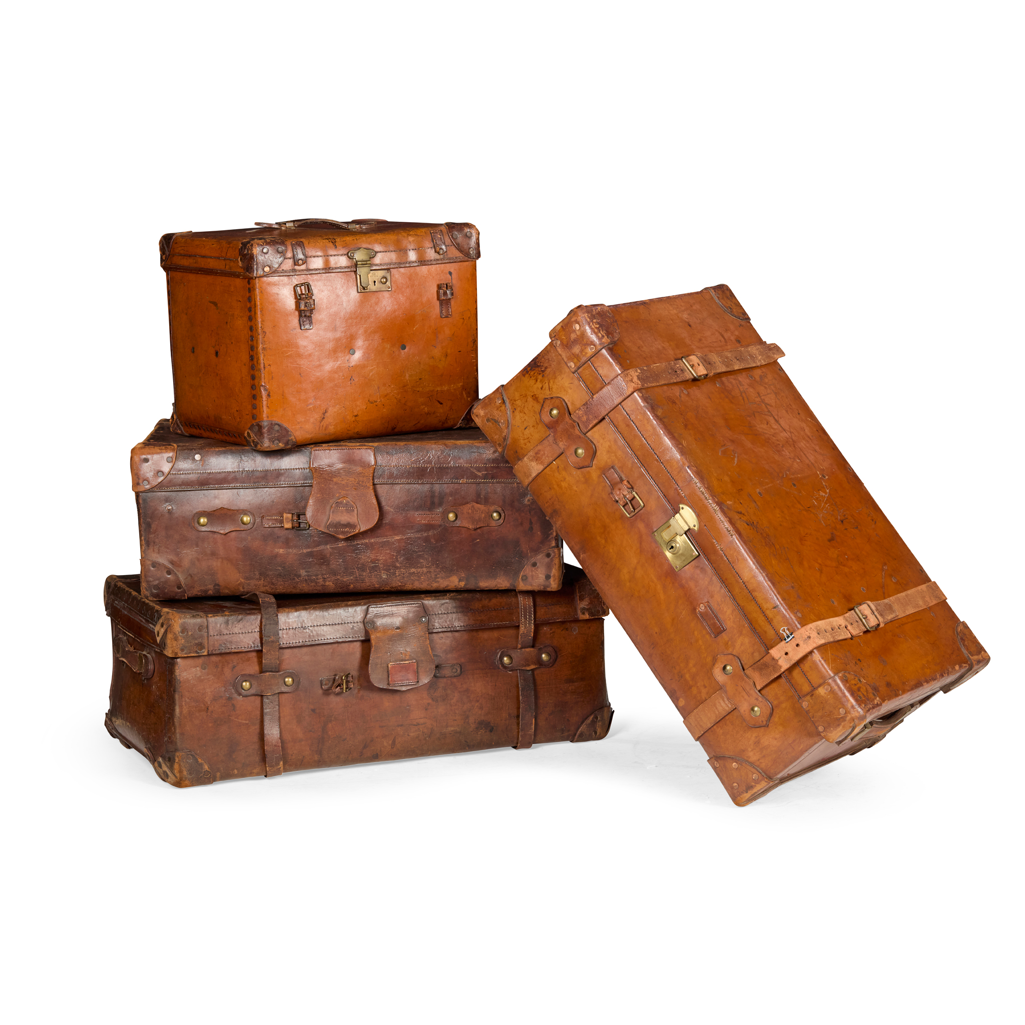 GROUP OF FOUR LEATHER TRUNKS AND CASES