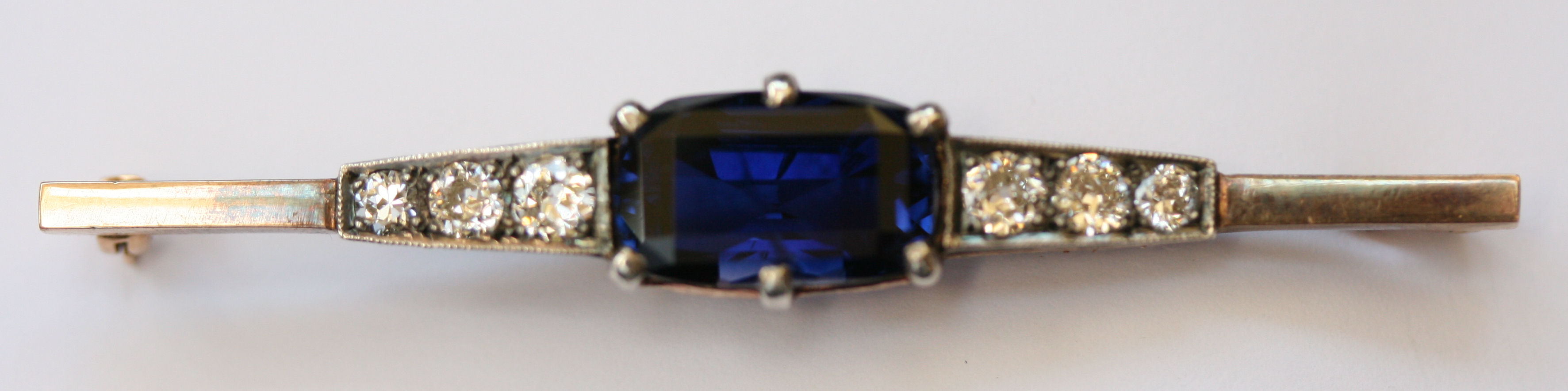 A 1920s sapphire and diamond bar brooch