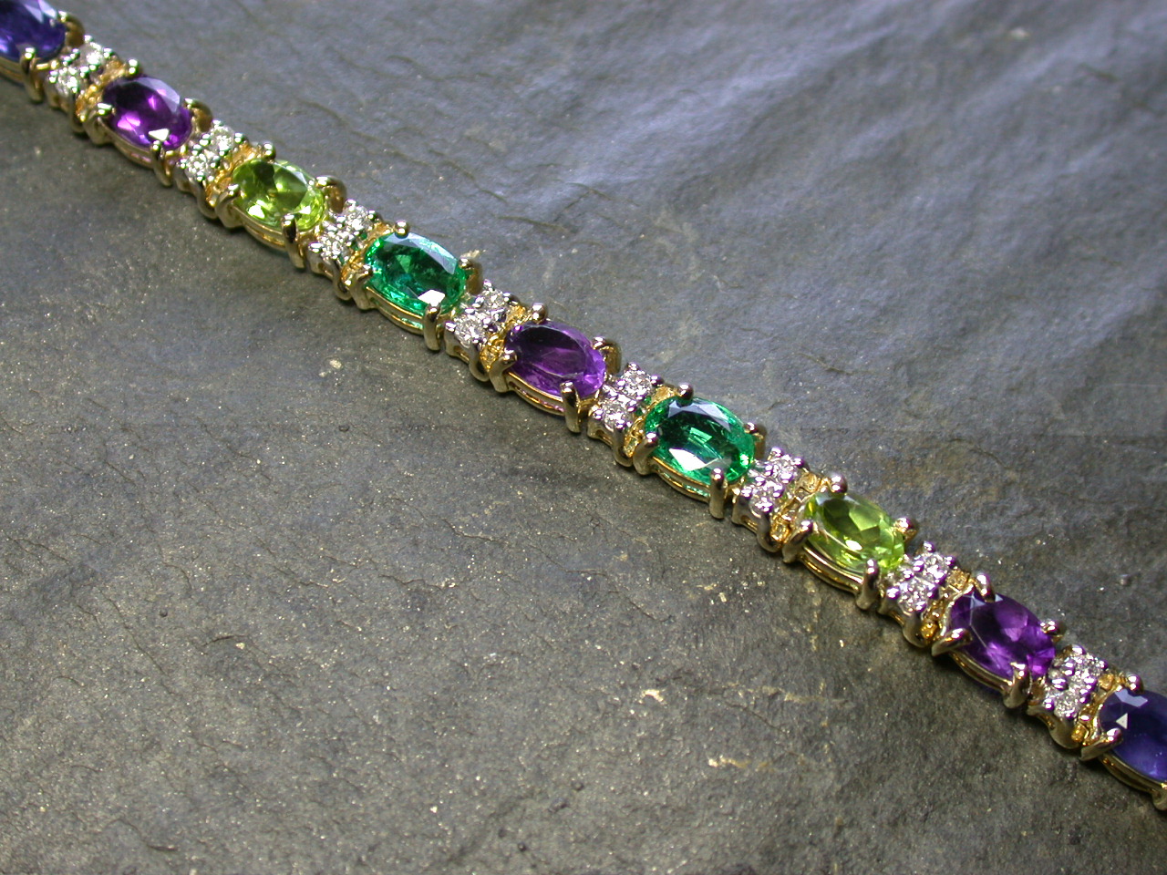 A multi-gem set bracelet,