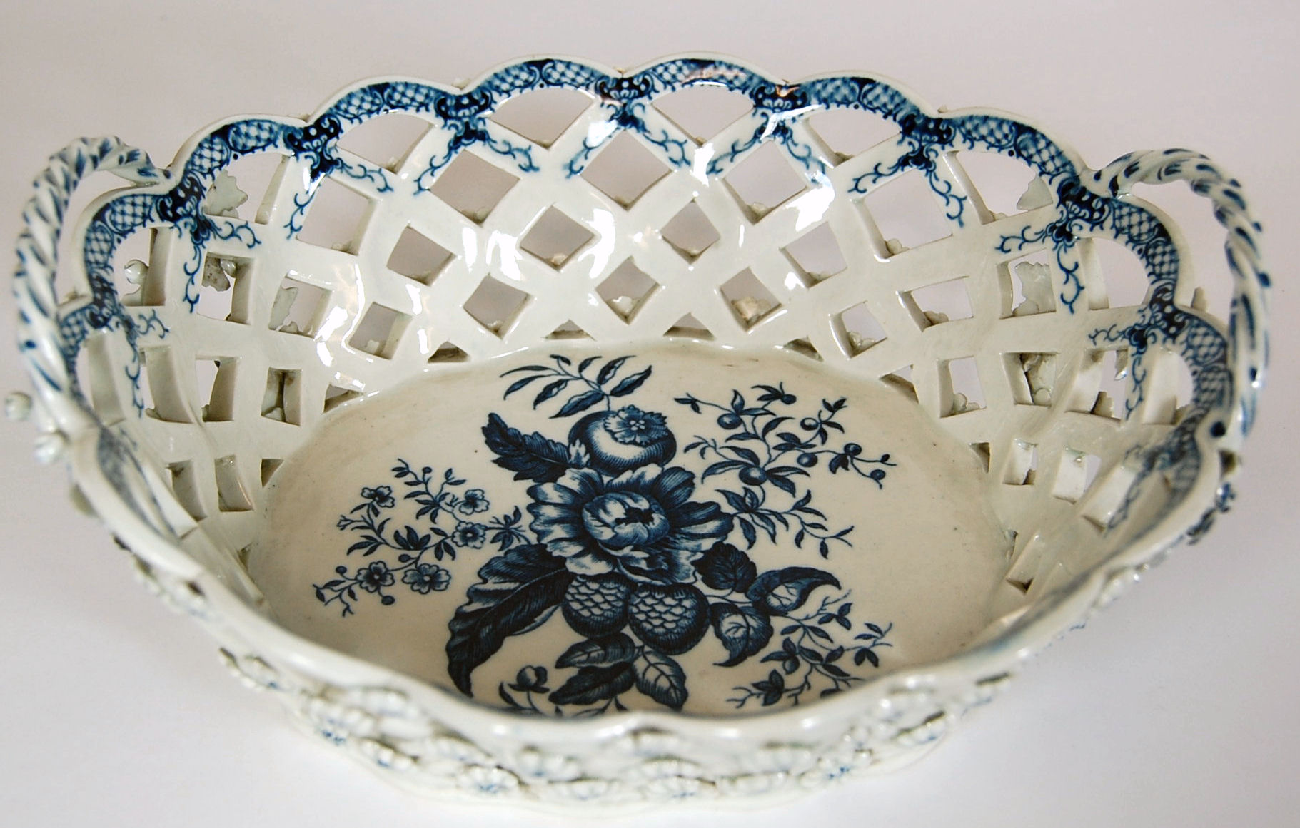 A large First period Worcester oval pierced twin handled basket