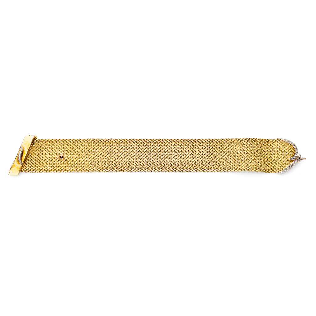 A mid 20th century woven yellow metal bracelet