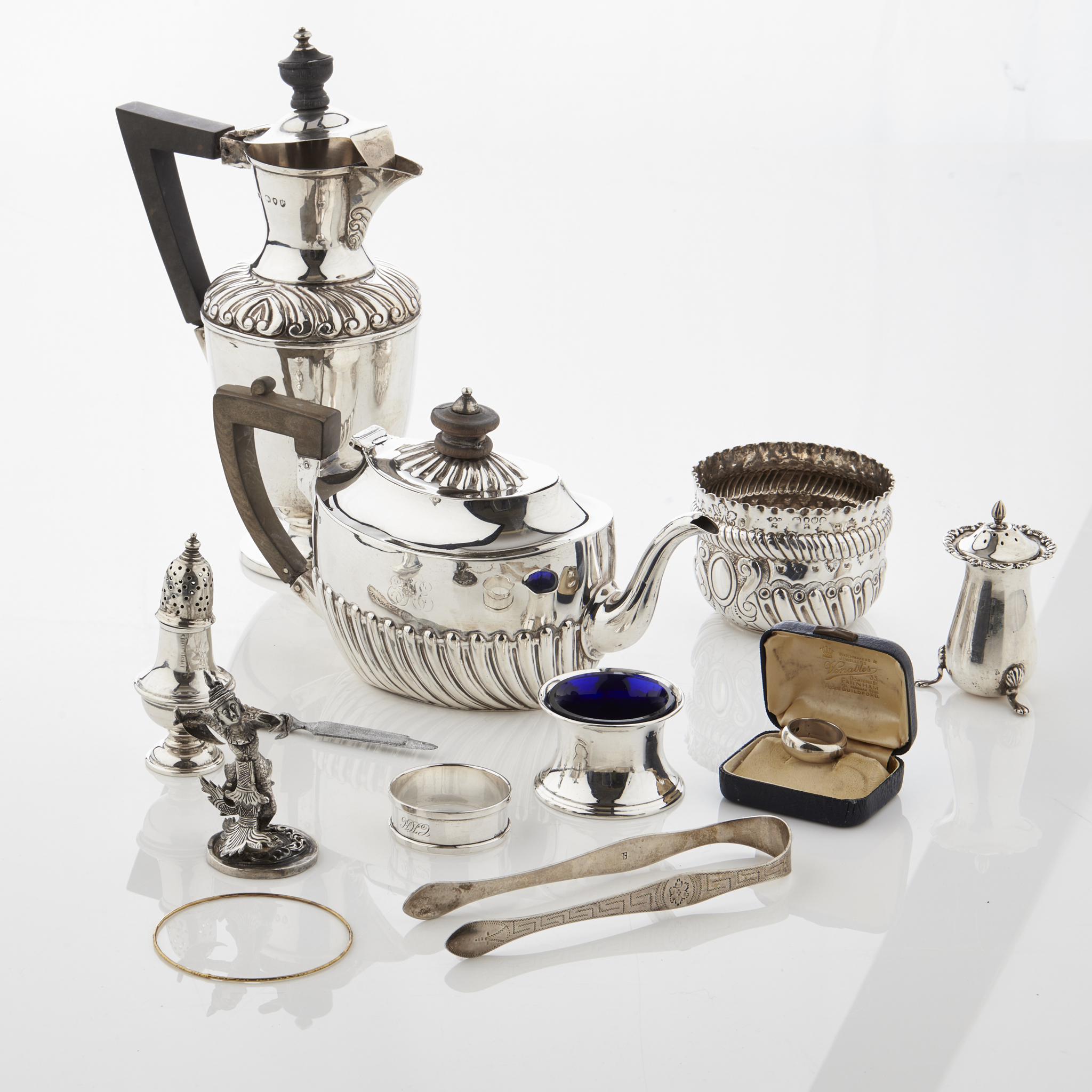 A collection of mixed silver including a teapot