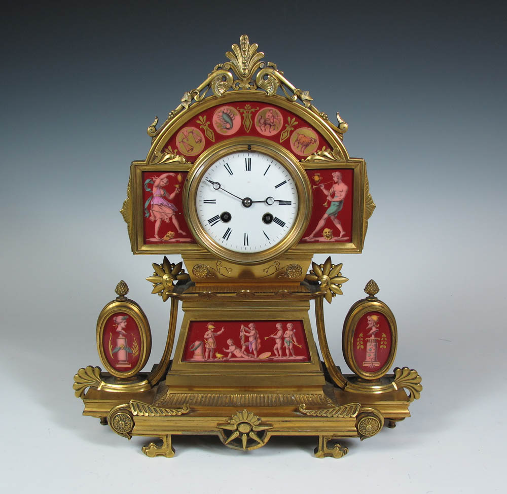 A mid 19th century Renaissance Revival gilt metal mantel clock