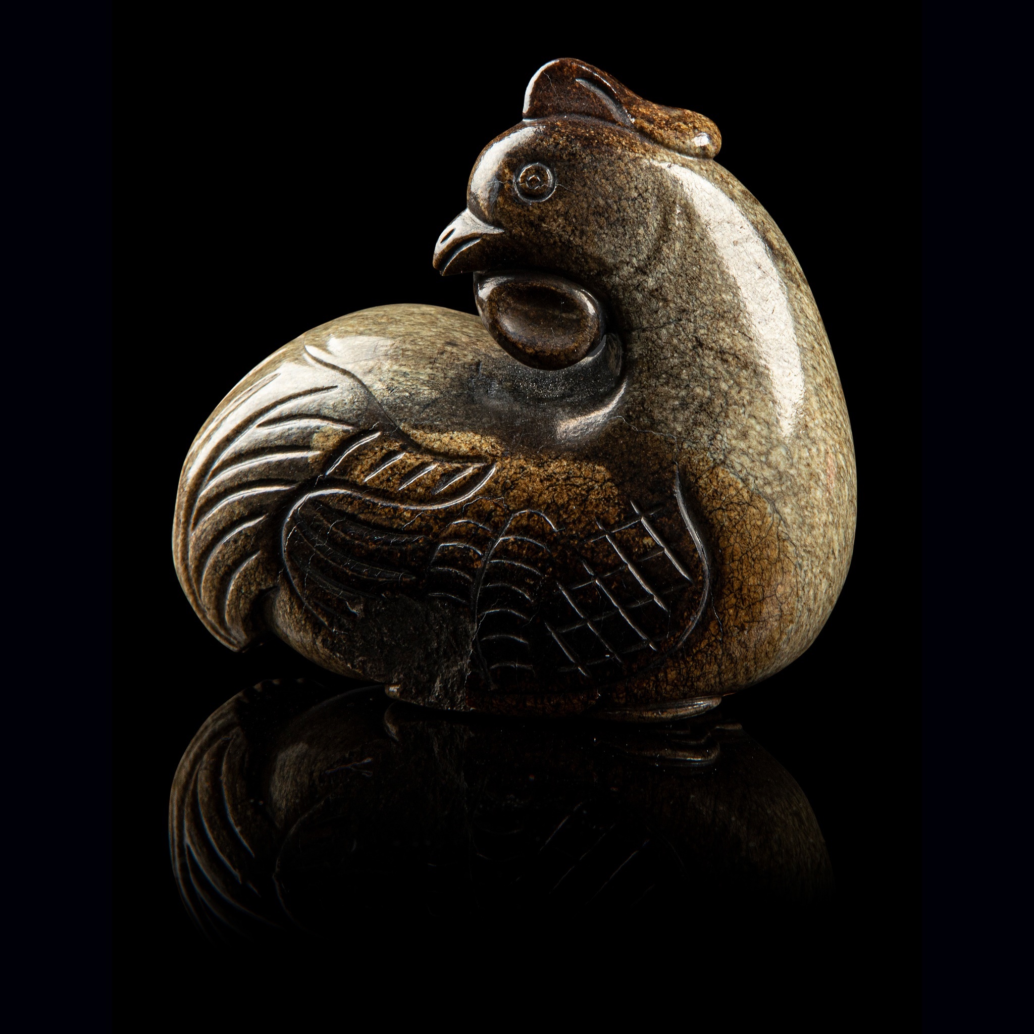 'CHICKEN-BONE' JADE CARVING OF A CHICKEN