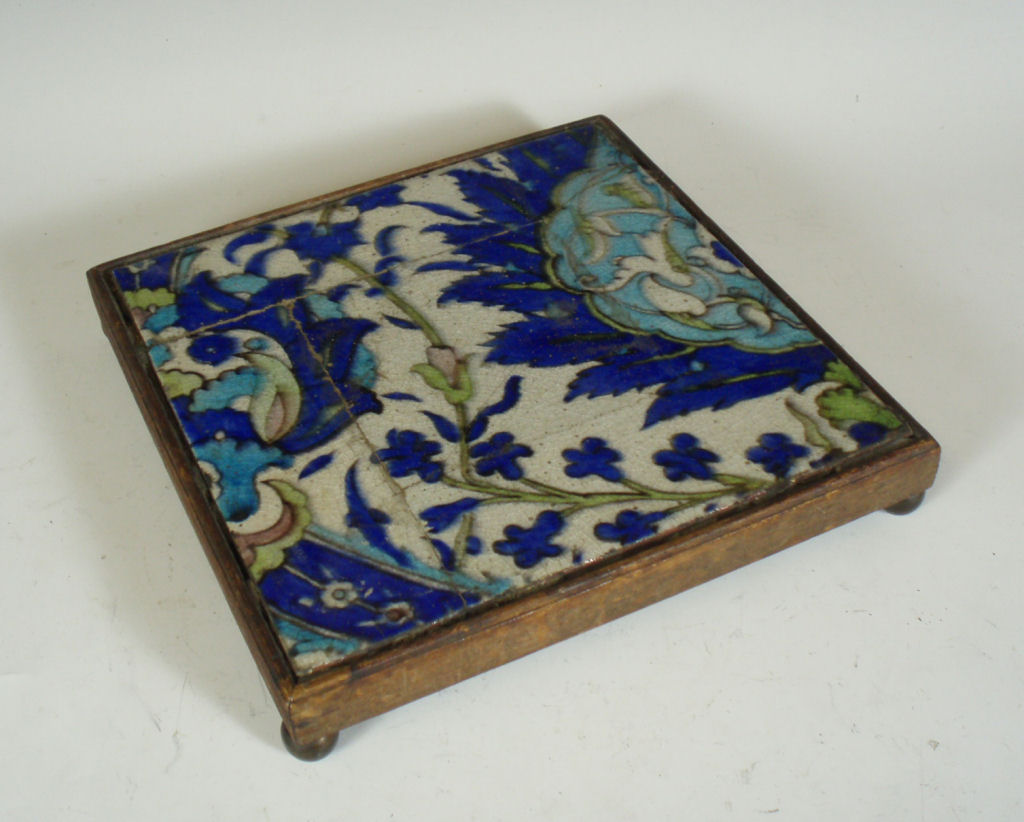 A framed Middle Eastern tile