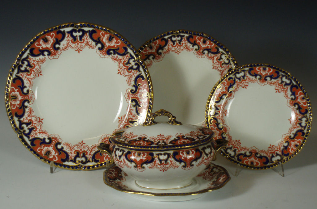 An early 20th century Royal Crown Derby Imari palette part dinner service