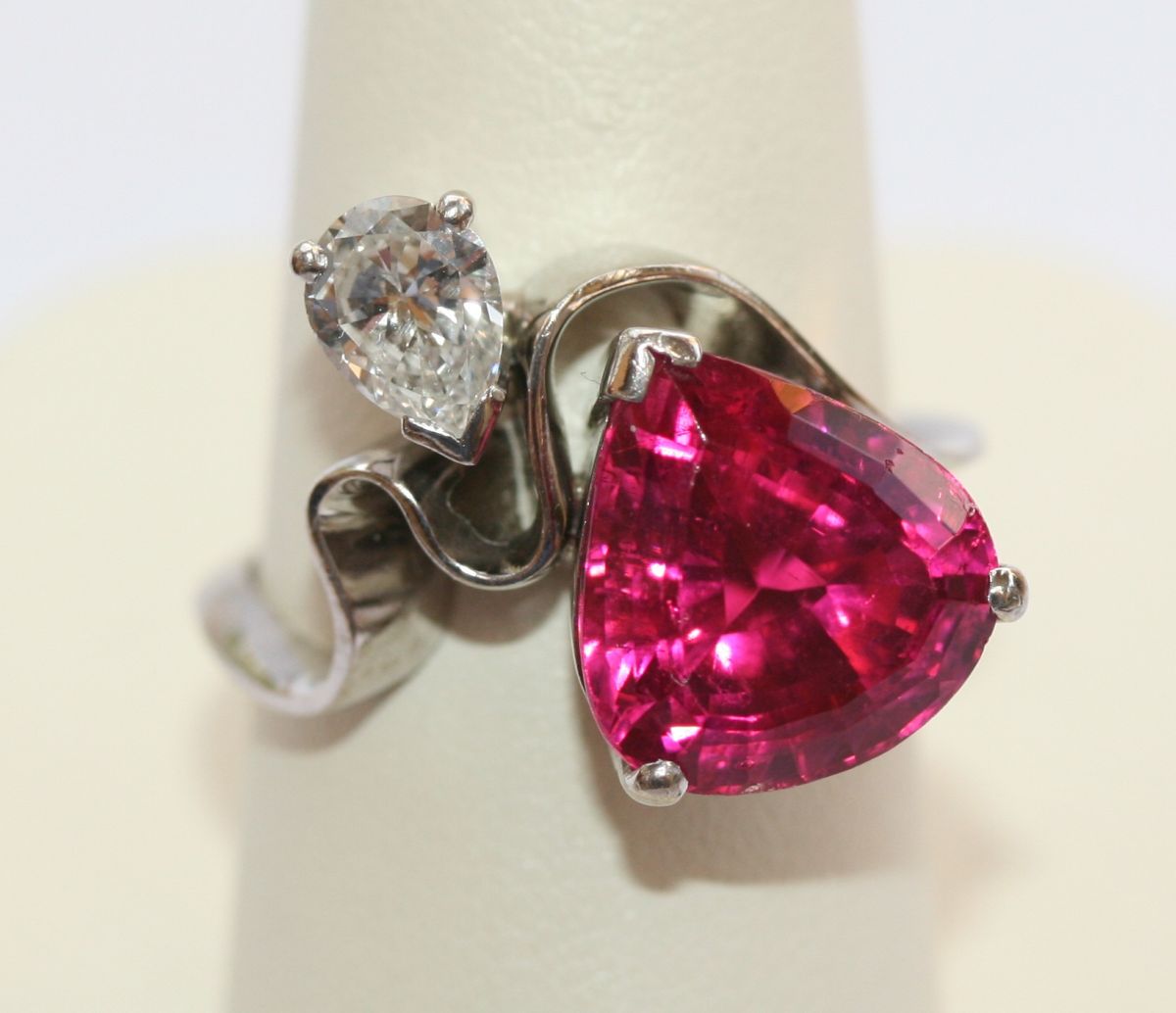 An 18ct white gold mounted rubellite and diamond set cocktail ring