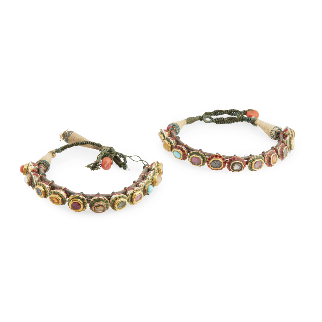 A pair of Indian 19th century Navaratna gem-set and enamelled arm-bands (bazubands)