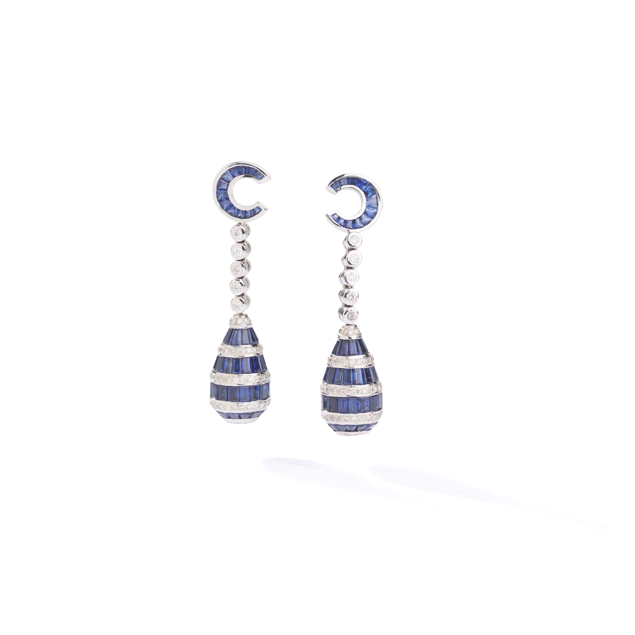A pair of sapphire and diamond earrings