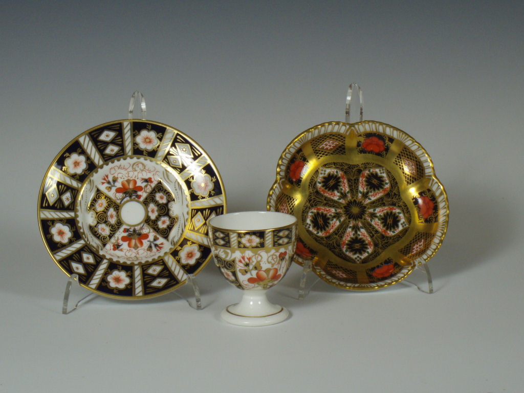 A matched set of six Royal Crown Derby 'Traditional Imari' egg cups and stands
