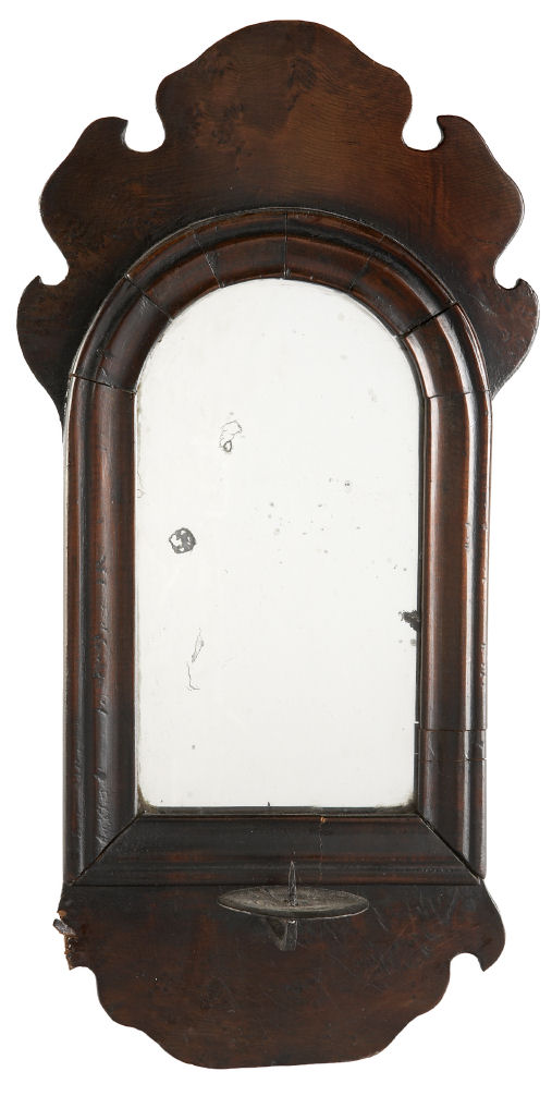 An unusual and small George II period yew wood mirror