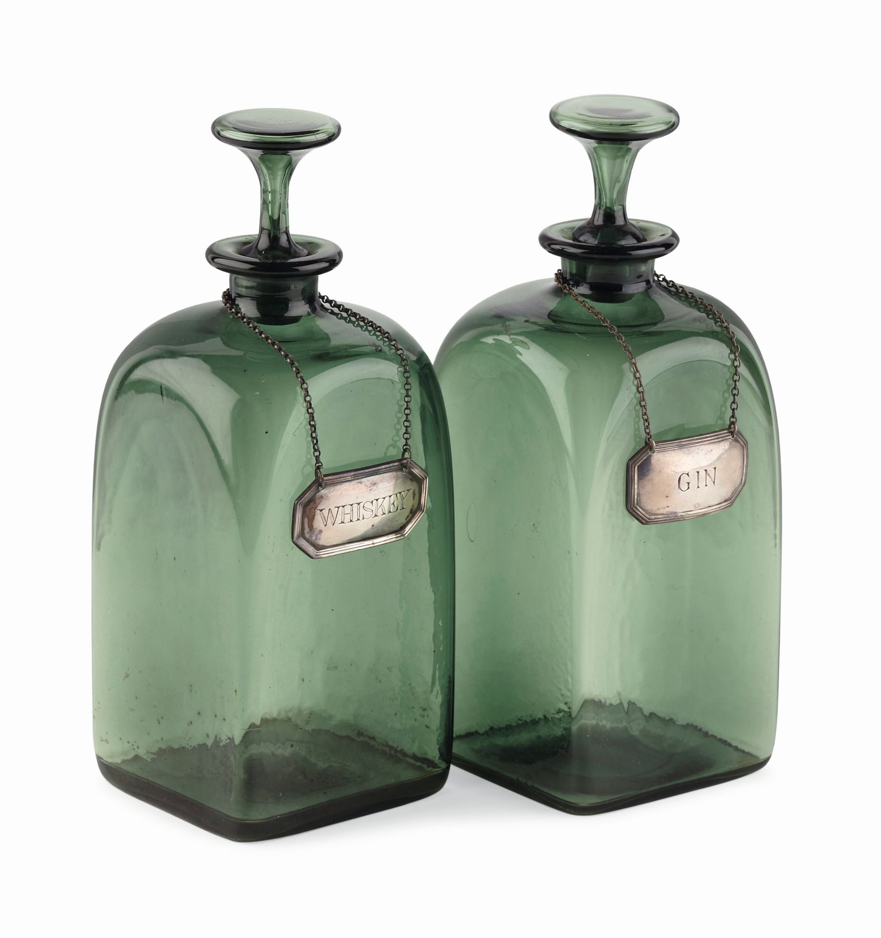 PAIR OF GREEN GLASS DECANTERS