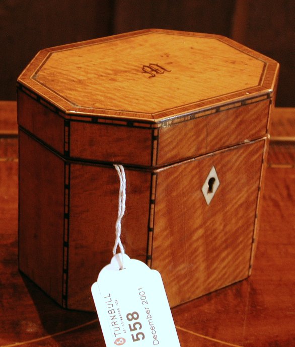 A Regency satinwood tea caddy