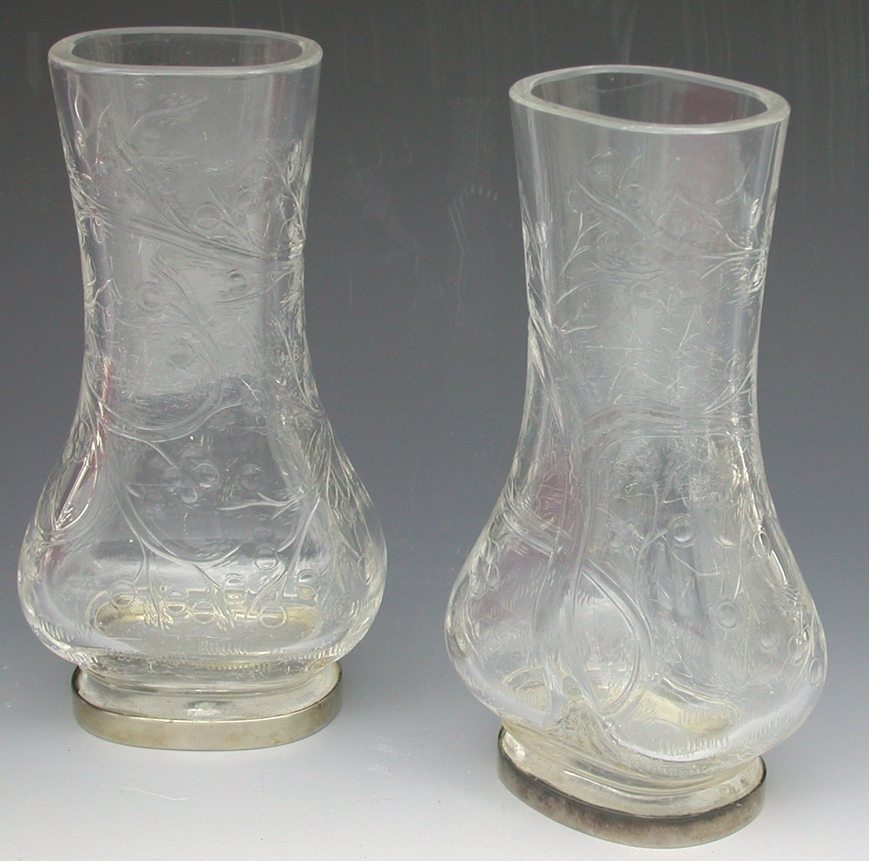 A pair of Baccarat 'rock crystal' glass vases,