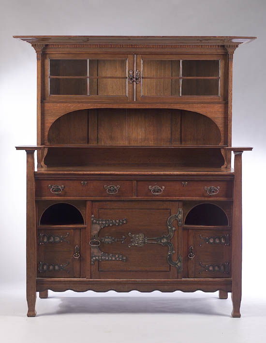 An Arts & Crafts oak sideboard