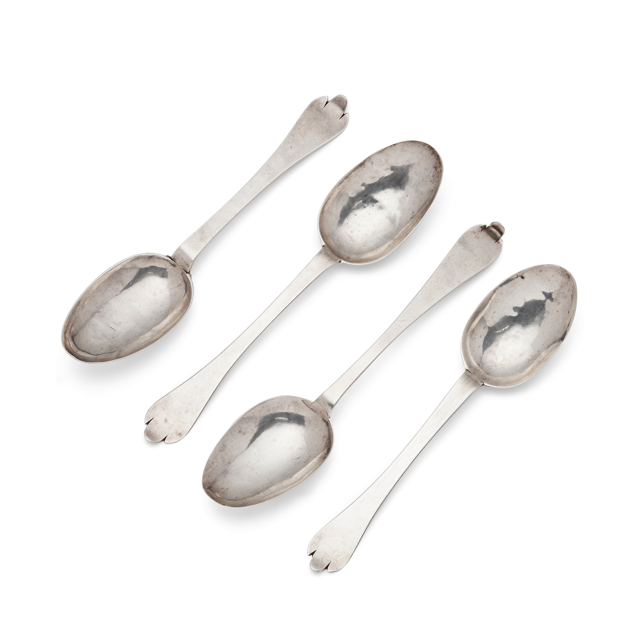 A COLLECTION OF FOUR CHANNEL ISLAND TREFID SPOONS