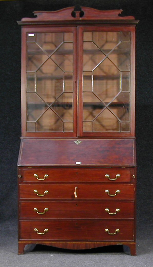 A large George III mahogany bureau bookcase,