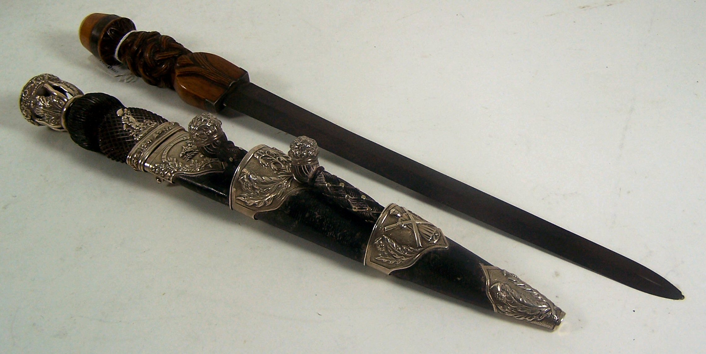 A white metal mounted dirk, ALTERATION - NOW 2 DIRKS