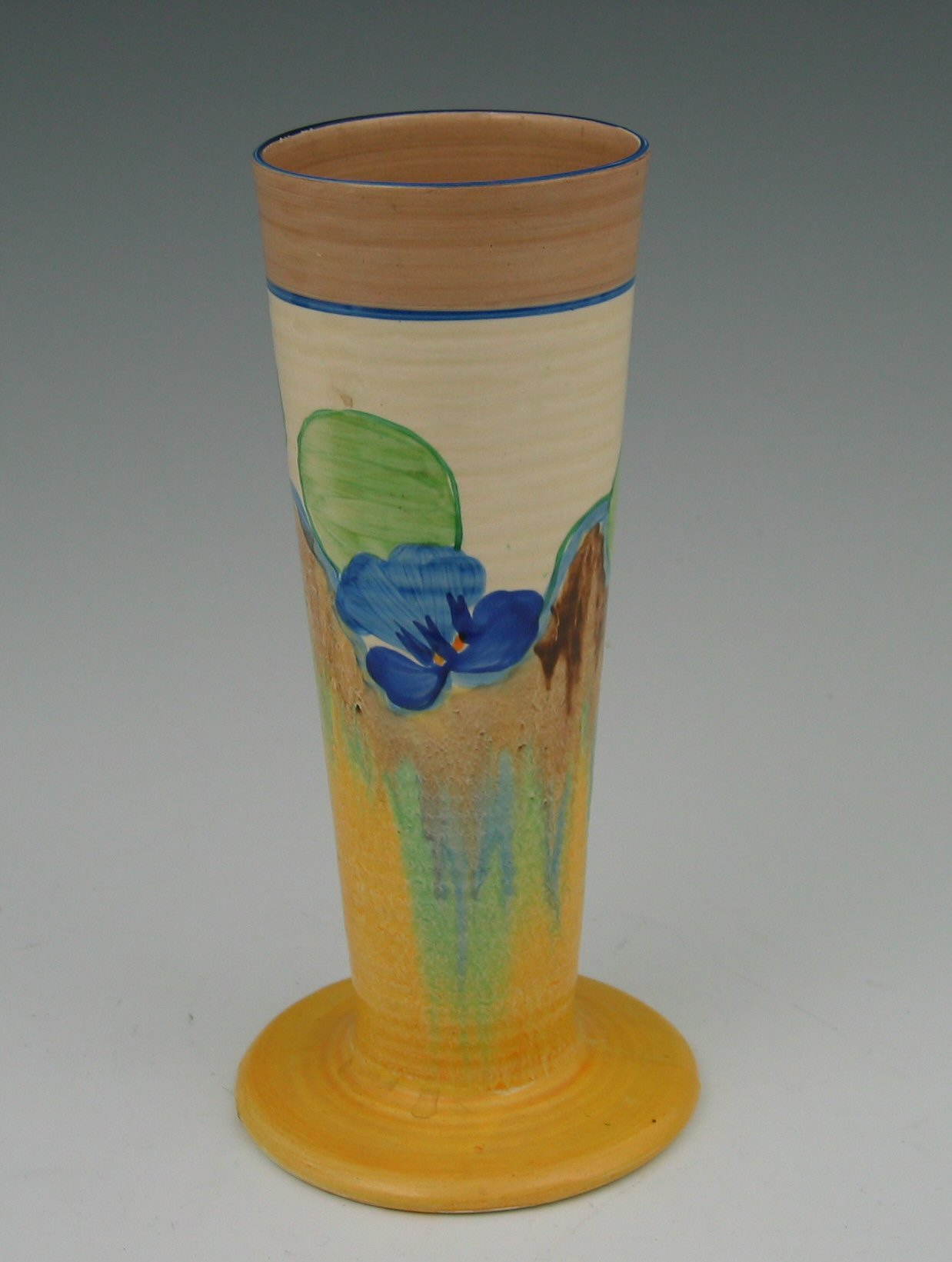 A Clarice Cliff tapering cylindrical vase,
