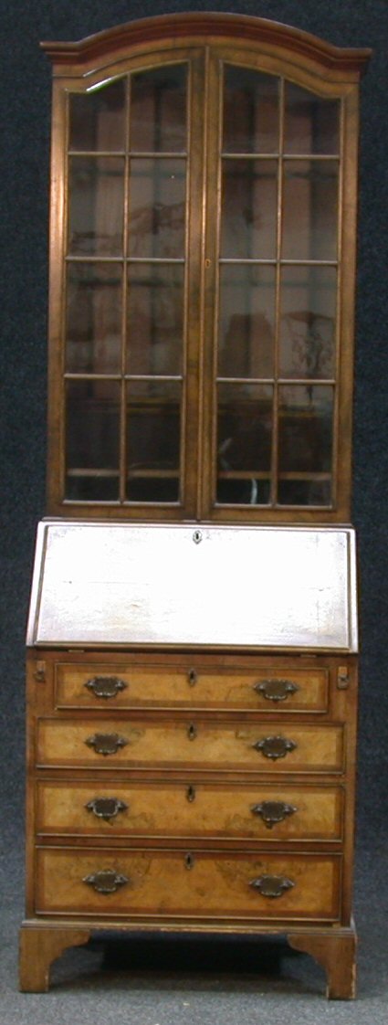 An early 20th century walnut bureau bookcase,