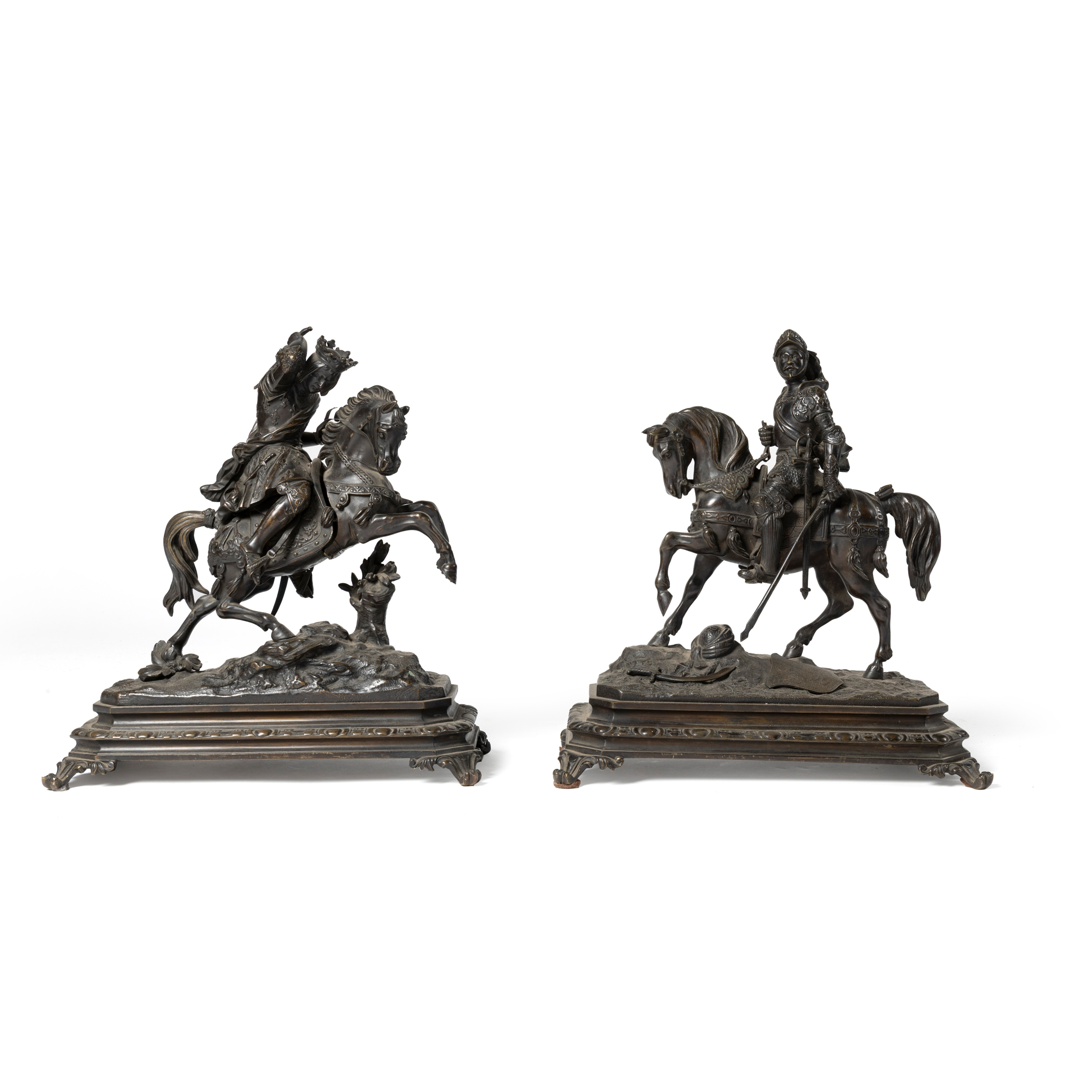 A PAIR OF BRONZE EQUESTRIAN FIGURE GROUPS