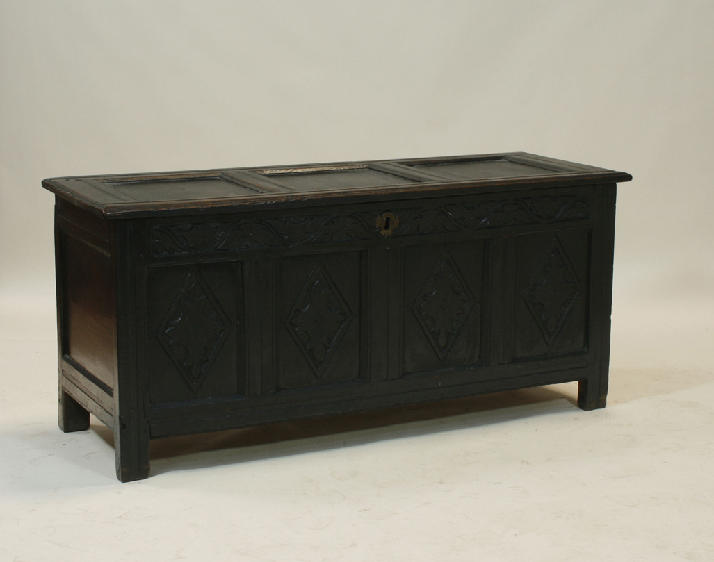 A 19th century oak carved blanket chest