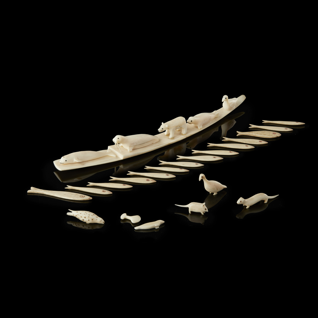 COLLECTION OF INUIT MARINE IVORY ANIMALS AND FISH GAMING COUNTERS