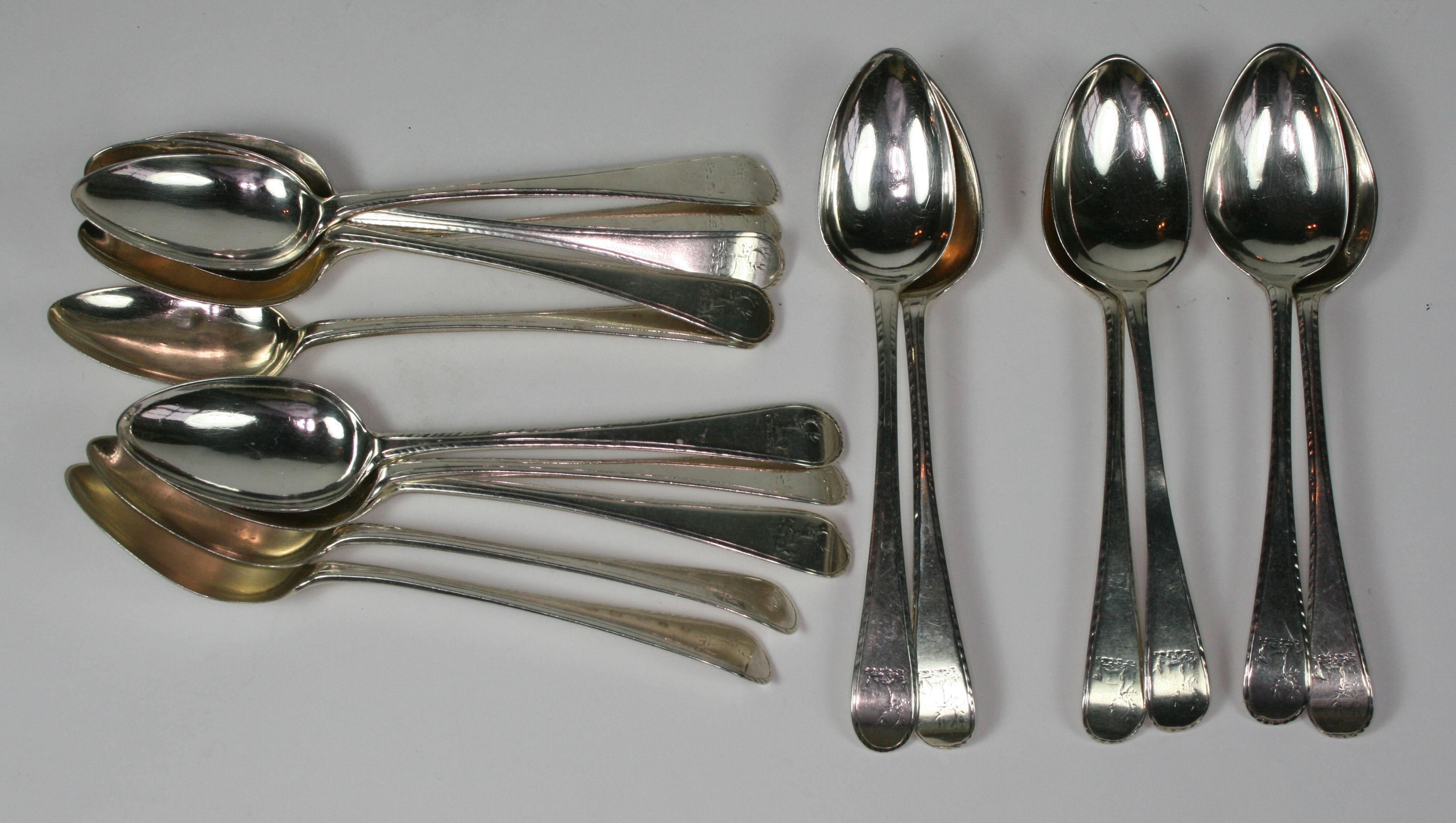 SET OF ELEVEN GEORGE III SILVER DESSERT SPOONS