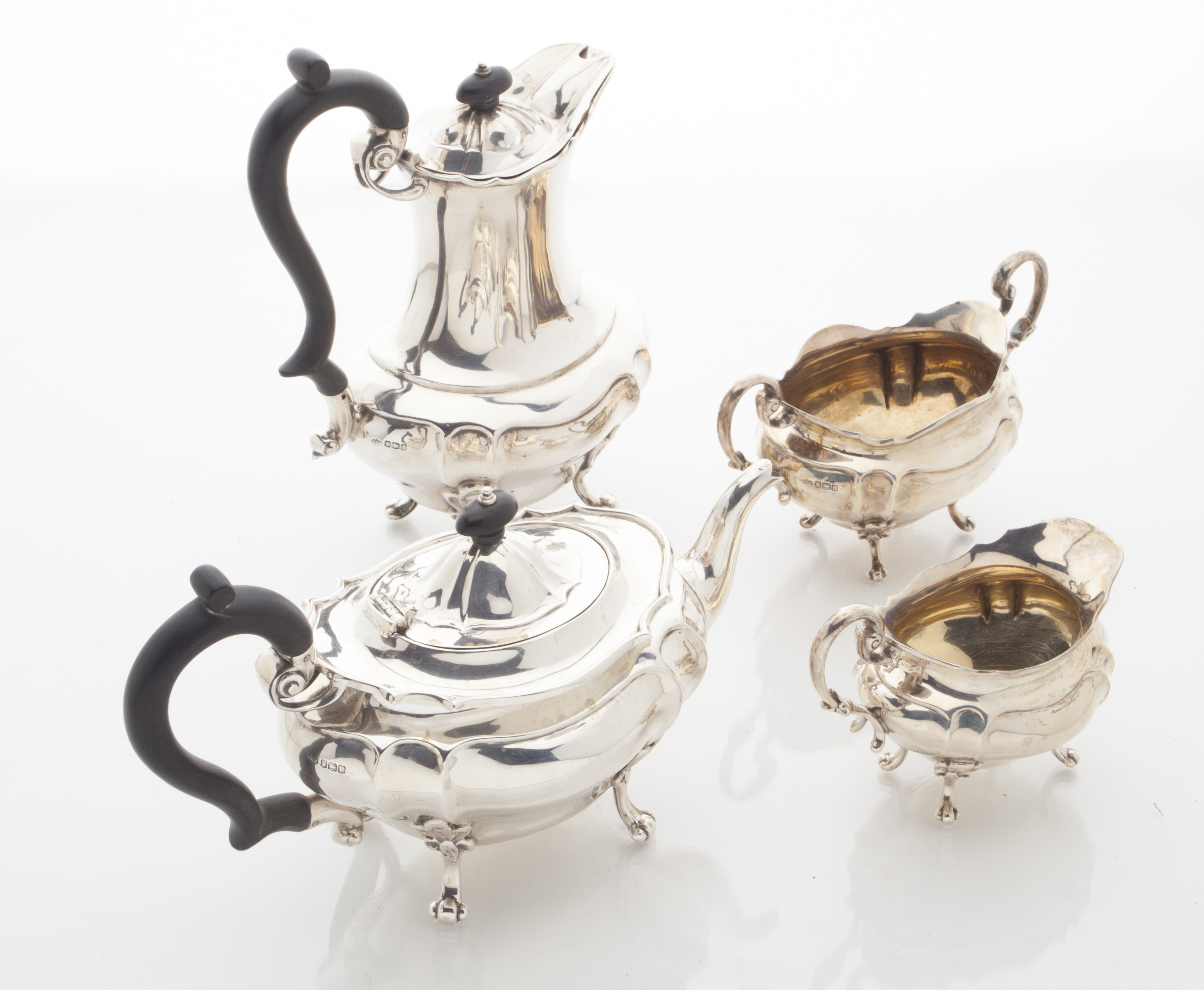 A four piece silver tea service