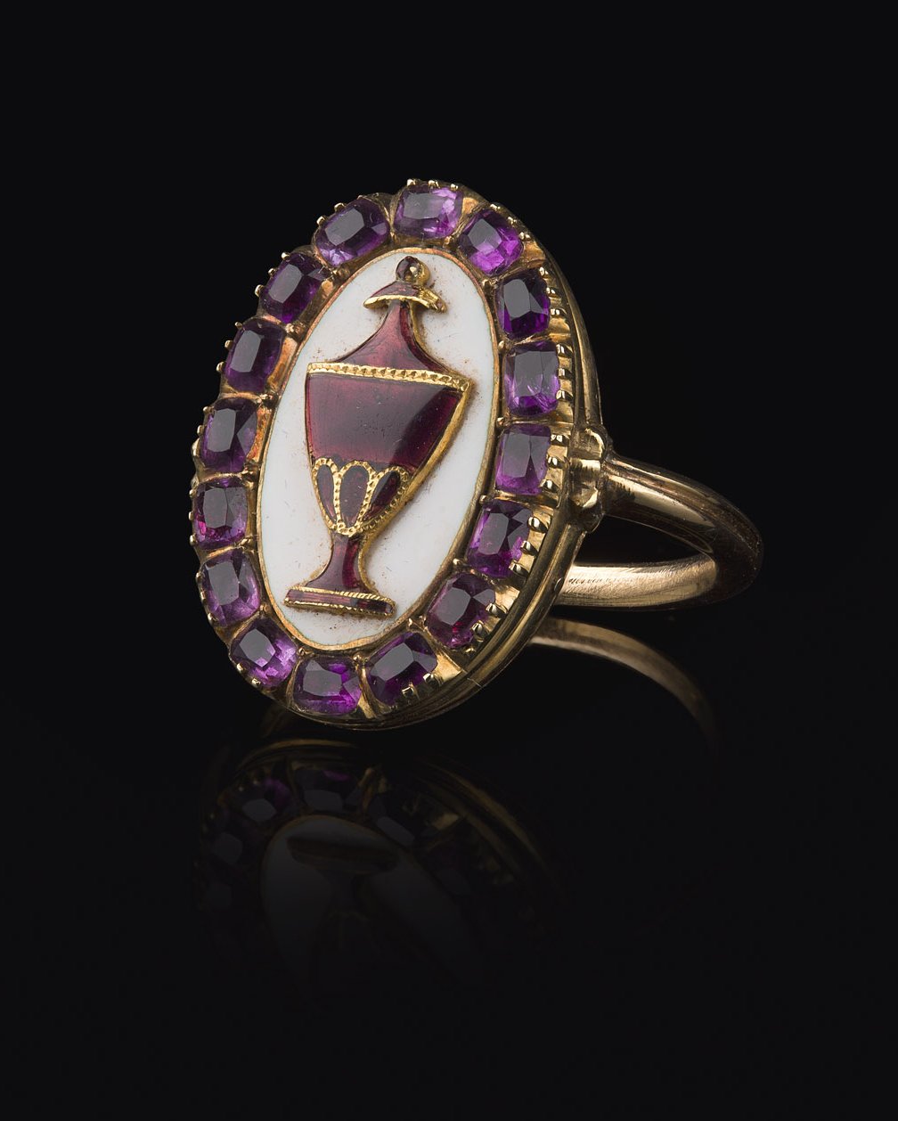 A George IV enamel and amethyst mourning ring
