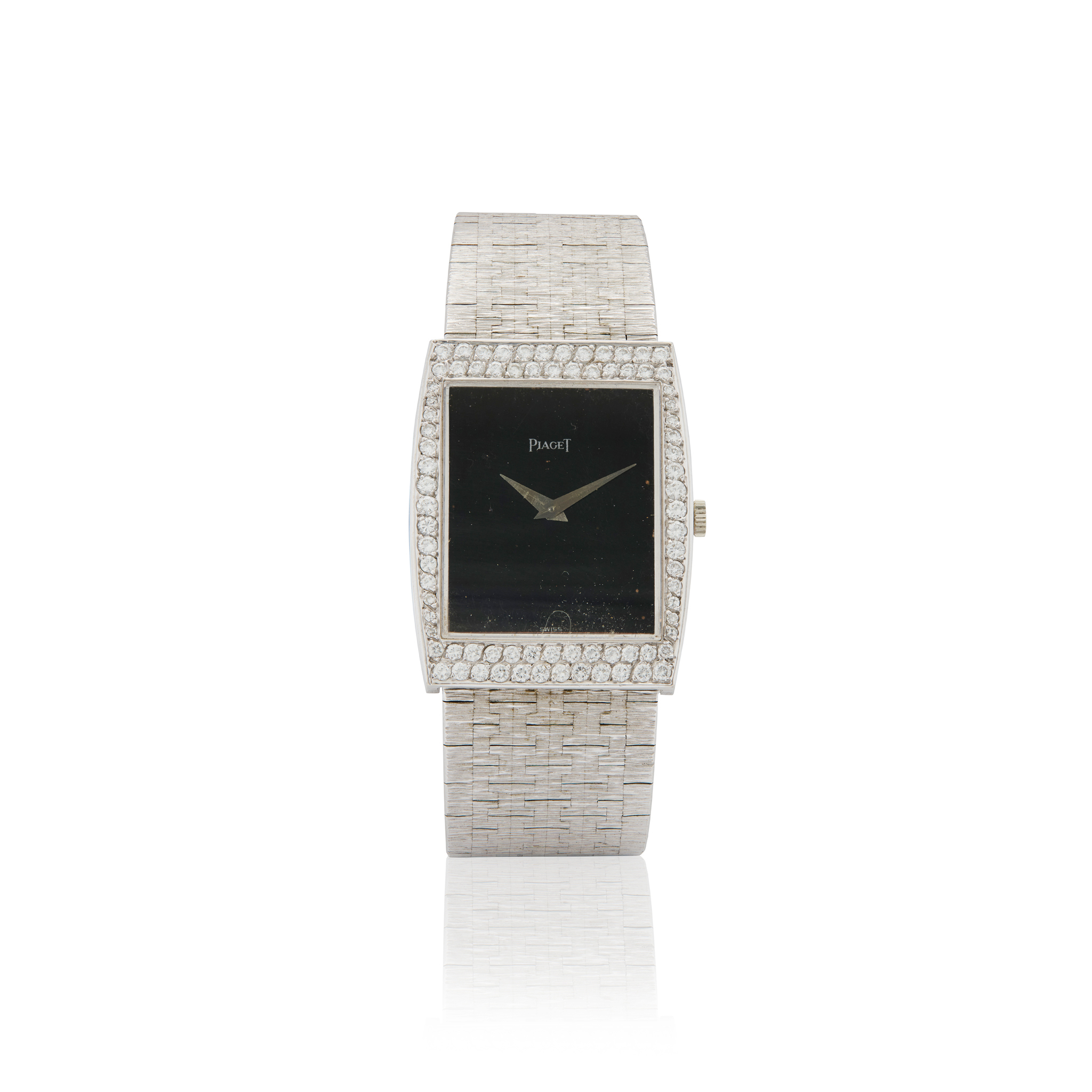 Piaget. A fine 18k white gold and diamond mechanical bracelet watch