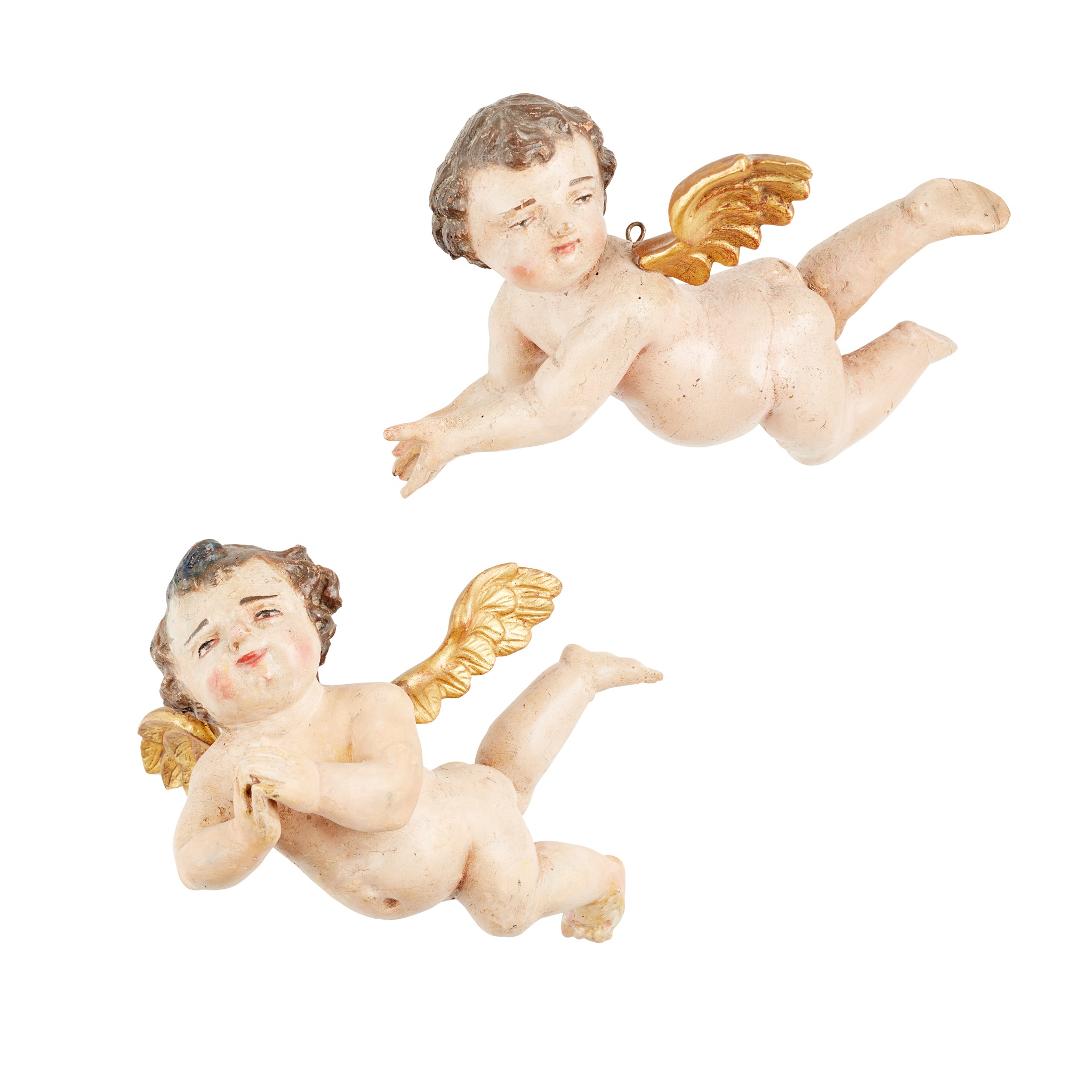 TWO ITALIAN CARVED POLYCHROMED AND PARCEL-GILT CARVED CHERUBS