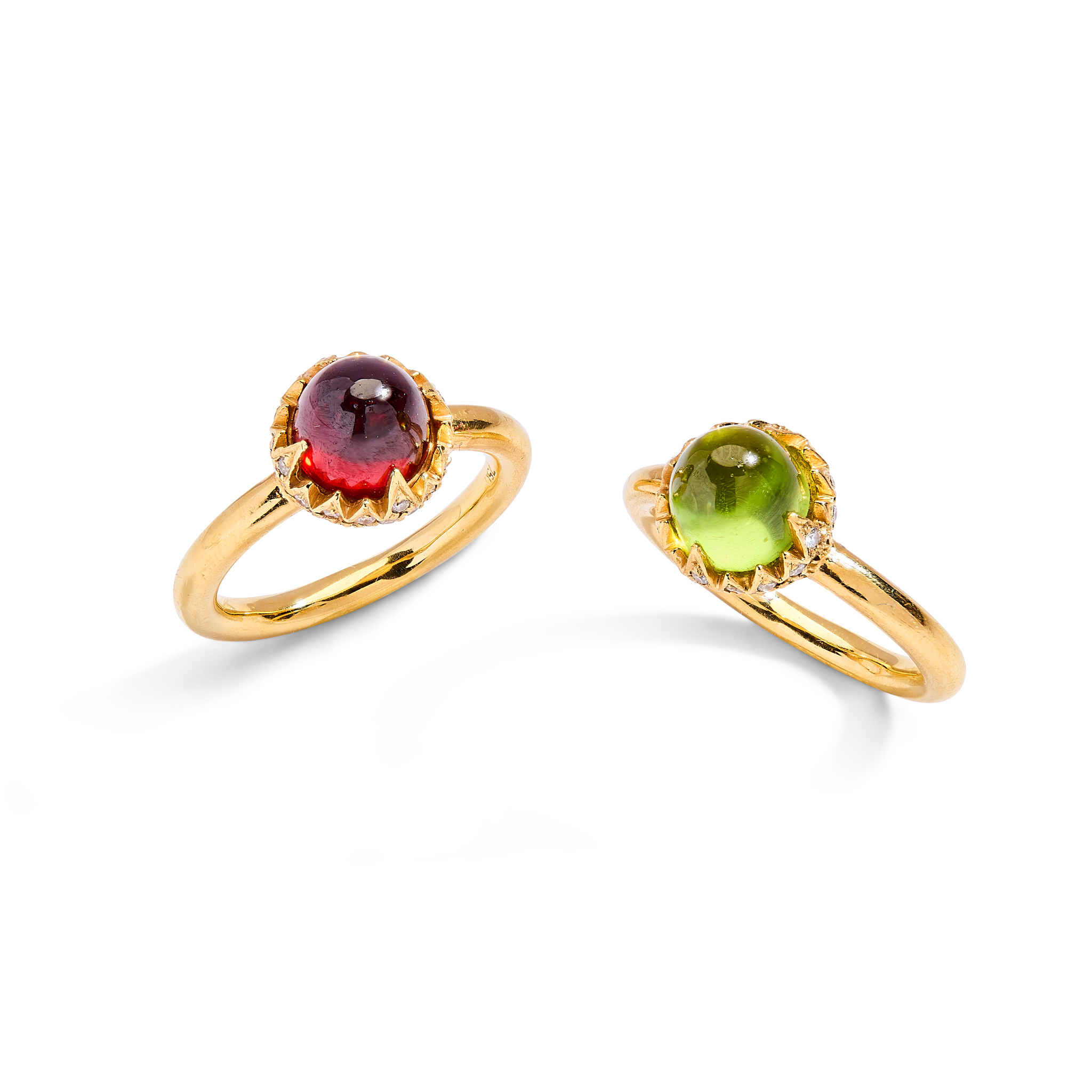 A pair of diamond and gem-set dress rings
