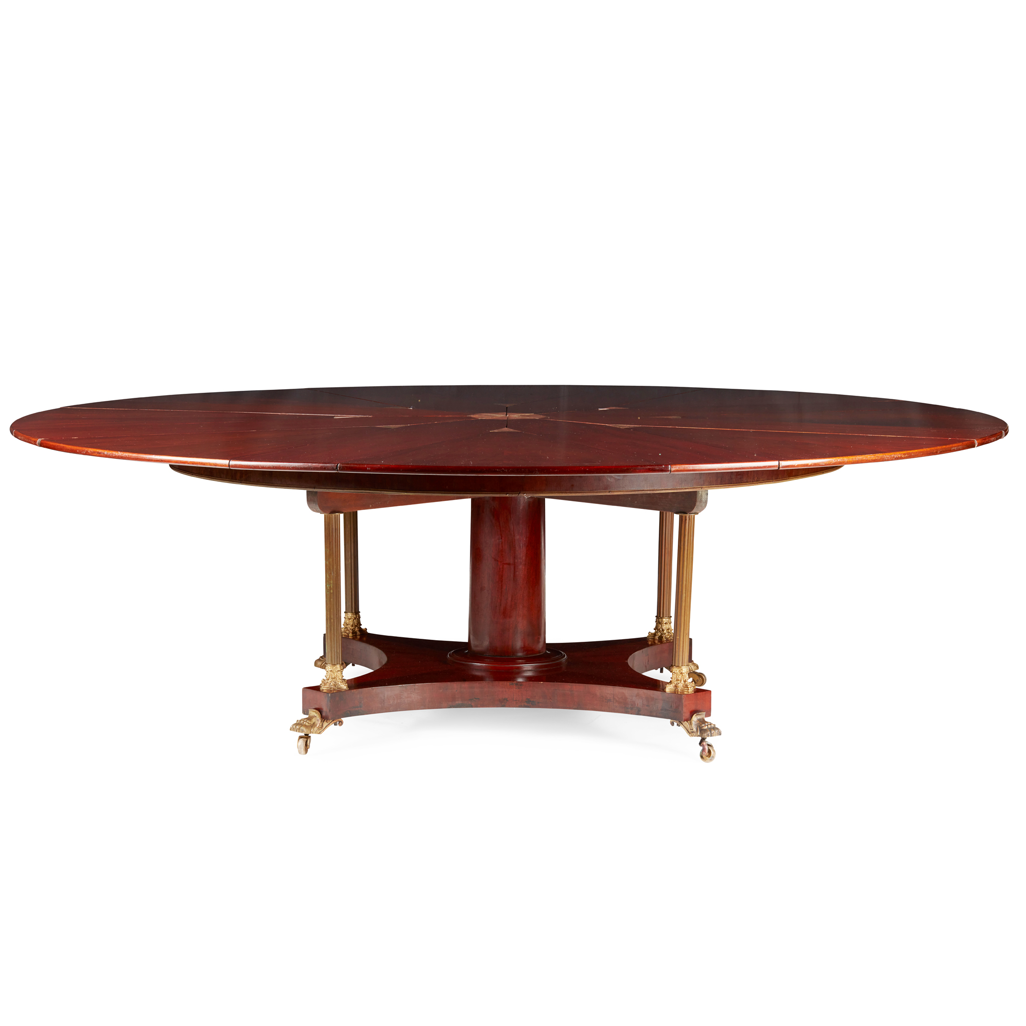 REGENCY STYLE MAHOGANY AND GILT BRASS JUPE ACTION DINING TABLE