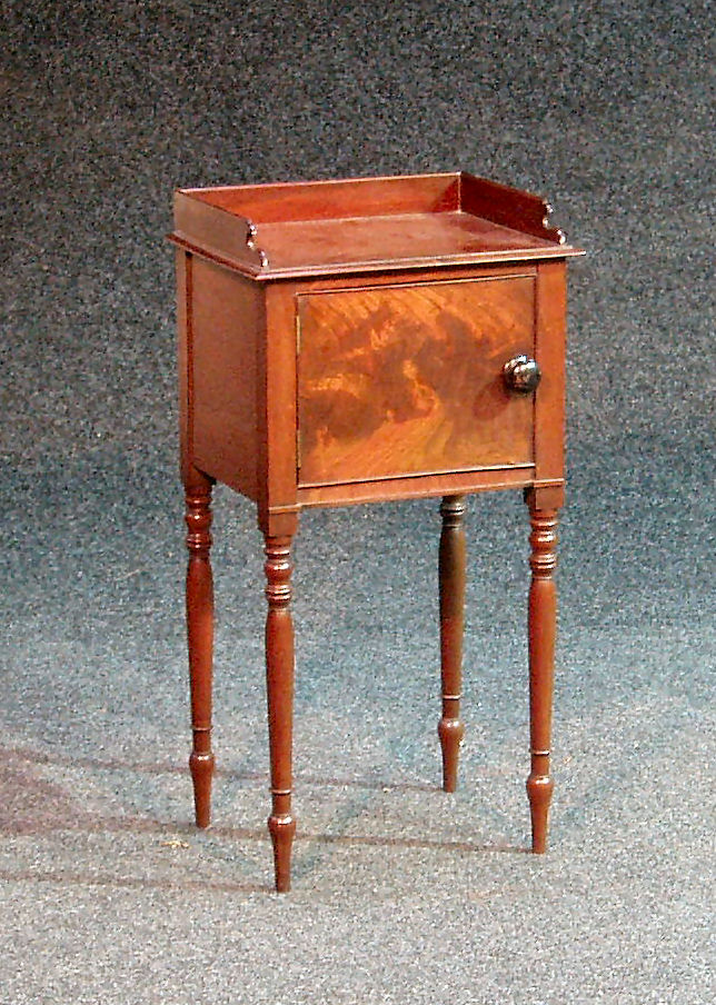 A George III mahogany pot cupboard,