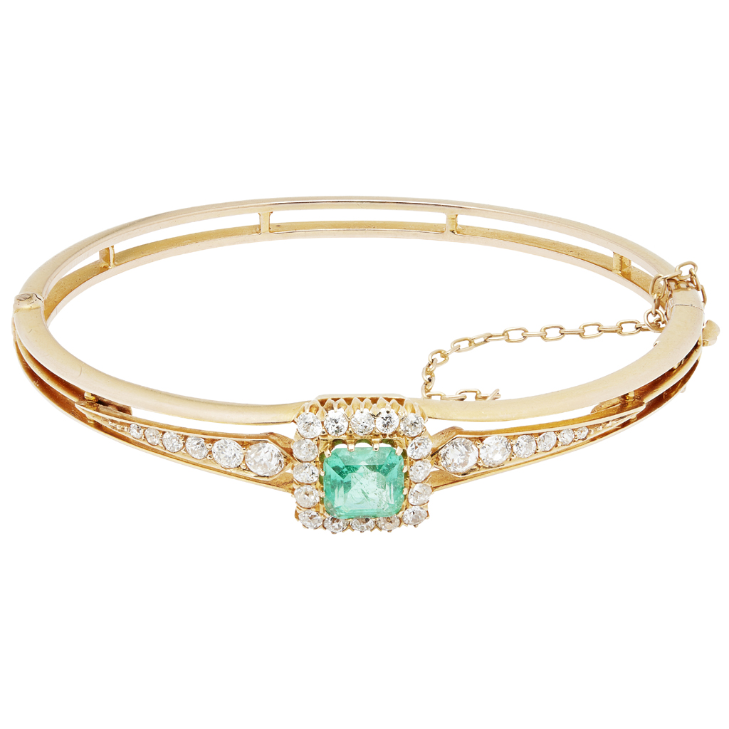 A modern emerald and diamond set bangle