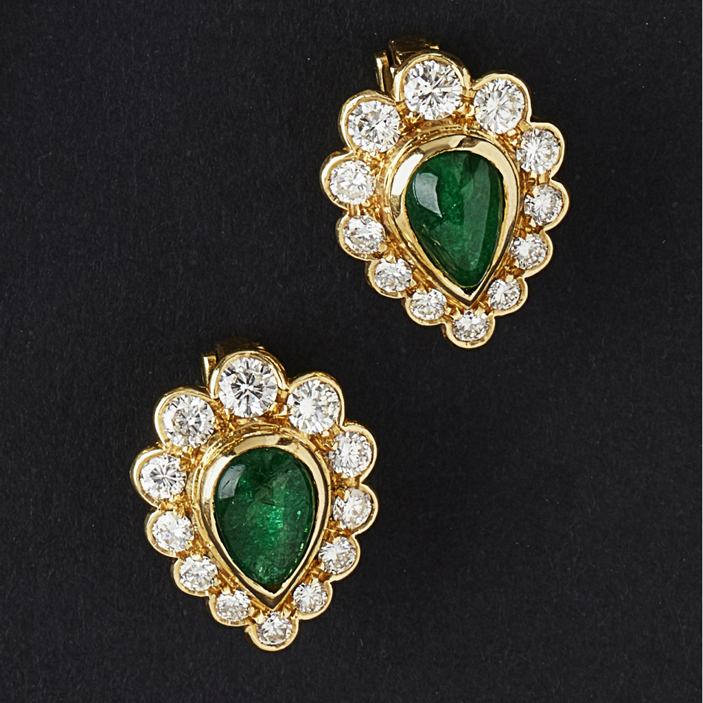 A pair of emerald and diamond set earrings