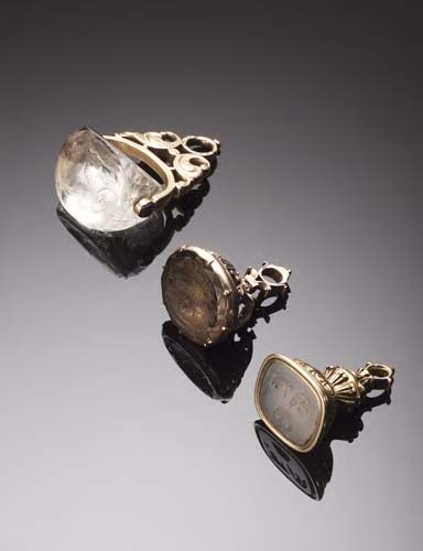 A collection of three gold mounted fob seals, of Nelson interest,