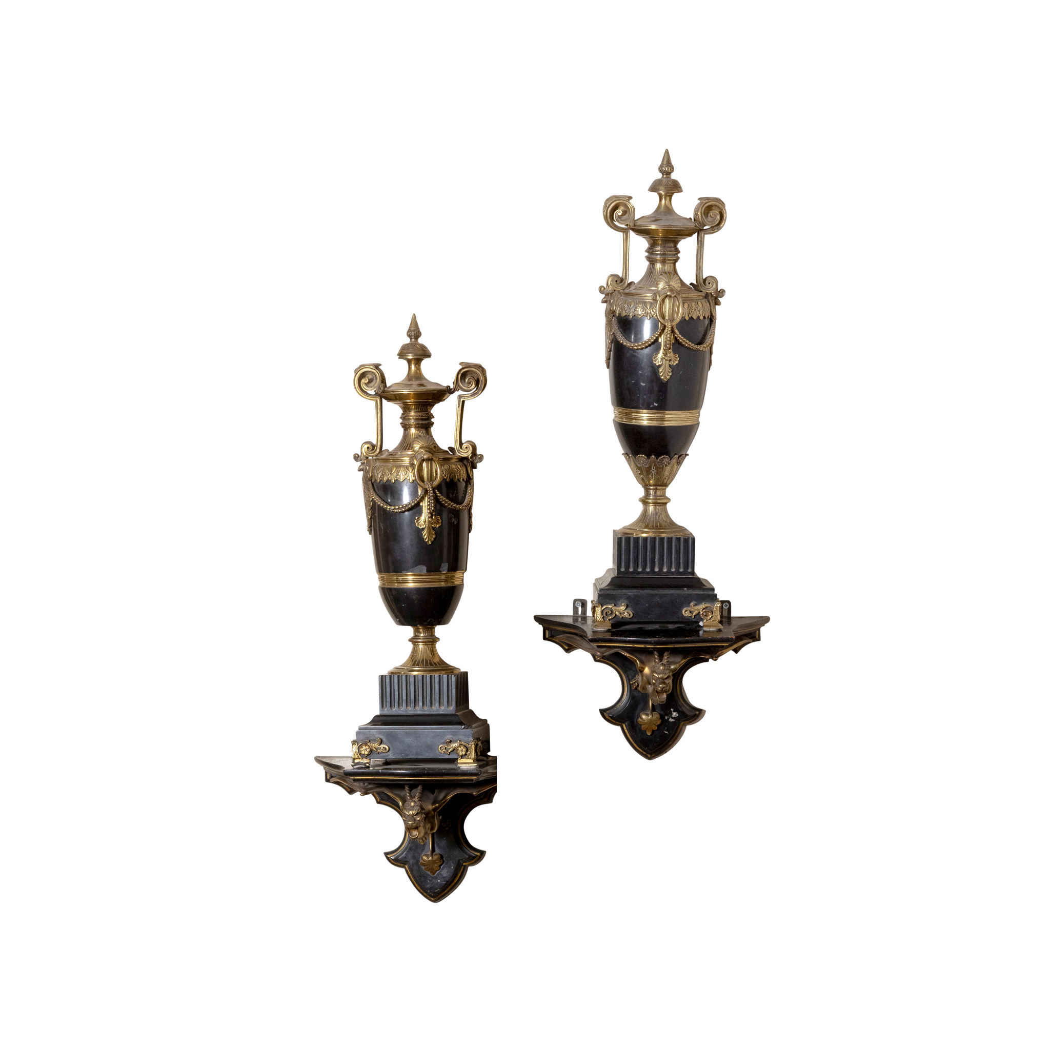 A PAIR OF FRENCH BLACK SLATE AND GILT BRONZE URNS AND BRACKETS